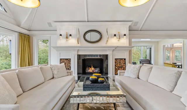 Living room with facing sofas and a fireplace — Deep River, CT residence