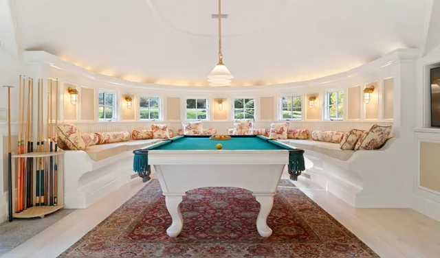 Billiard room with a green-felt table and window seating — Deep River, CT residence